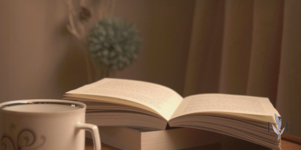 quiet reading space with book and tea for sitting in silence